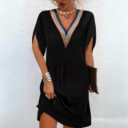 Annet - Robe élégante avec décolleté en V brodé